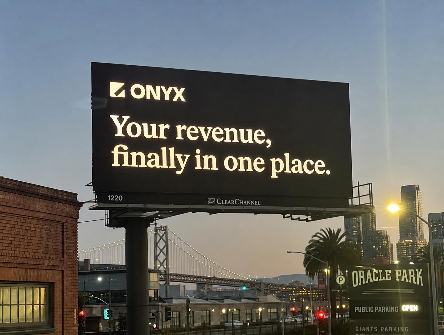 Digital LED startup billboard downtown at dusk